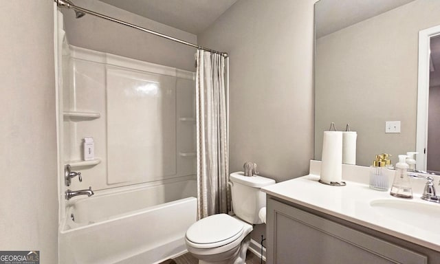 full bath with vanity, shower / bath combo, and toilet