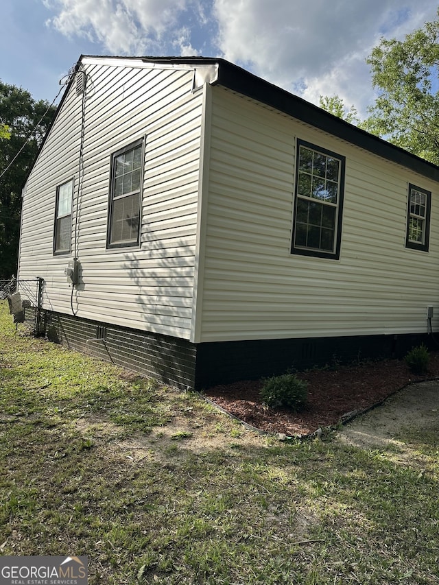 view of property exterior featuring crawl space