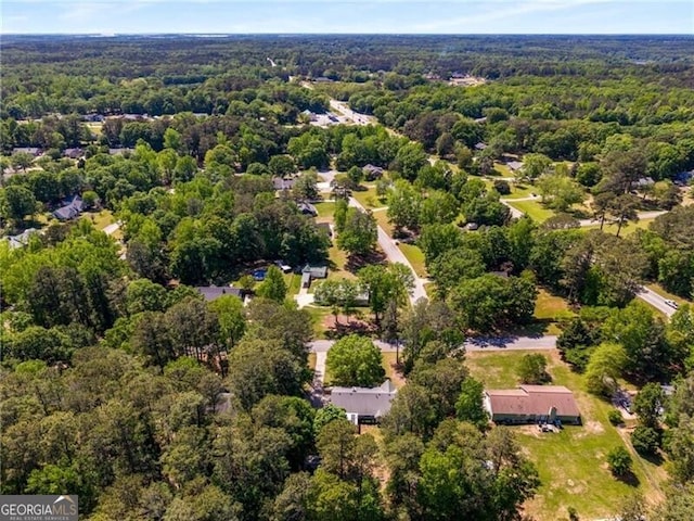 bird's eye view with a view of trees