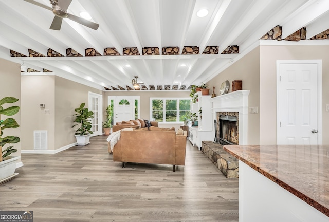 701 Mask Rd, Brooks, GA 30205 - living area with recessed lighting, ceiling fan, beam ceiling, and light wood-style floors