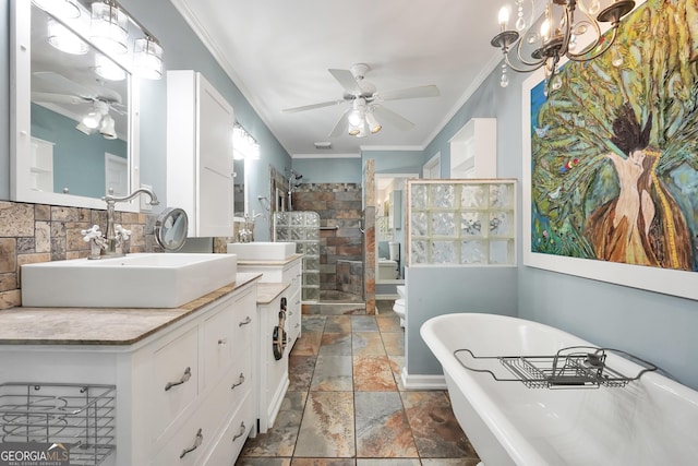 701 Mask Rd, Brooks, GA 30205 - full bathroom with crown molding, a freestanding bath, ceiling fan with notable chandelier, tiled shower, and stone tile flooring