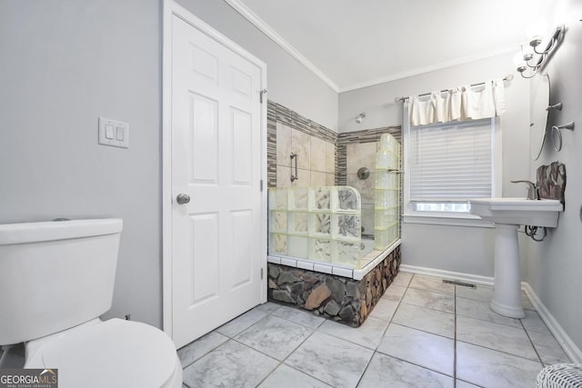 701 Mask Rd, Brooks, GA 30205 - bathroom with crown molding, tile patterned flooring, a walk in shower, baseboards, and toilet