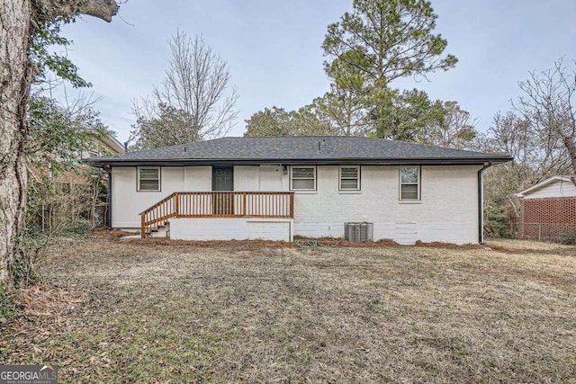 2091 Parker Ranch Rd SE, Atlanta, GA 30316 - rear view of property featuring brick siding, cooling unit, and a shingled roof