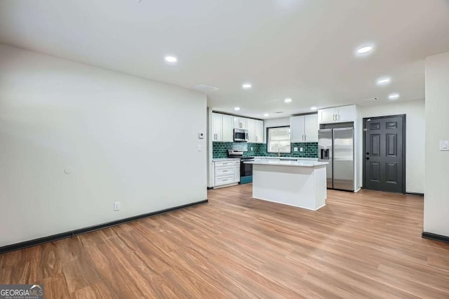 2091 Parker Ranch Rd SE, Atlanta, GA 30316 - kitchen with recessed lighting, appliances with stainless steel finishes, and light wood-style flooring