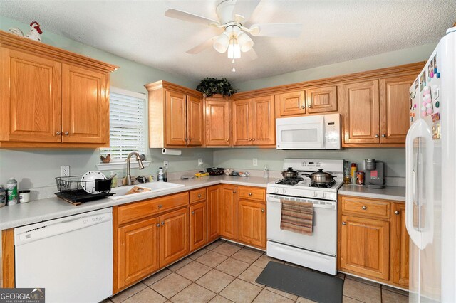 221 Hunters Xing SE, Calhoun, GA 30701 - kitchen with white appliances, light tile patterned flooring, light countertops, and ceiling fan