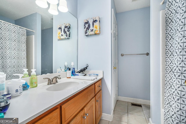 221 Hunters Xing SE, Calhoun, GA 30701 - full bath with vanity, tile patterned floors, and a shower with shower curtain