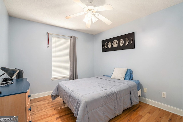 221 Hunters Xing SE, Calhoun, GA 30701 - bedroom featuring light wood-type flooring and a ceiling fan
