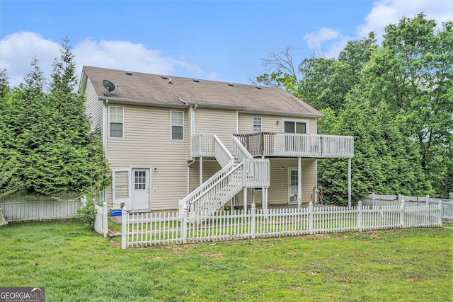 221 Hunters Xing SE, Calhoun, GA 30701 - back of property featuring a wooden deck, stairway, a fenced backyard, and a shingled roof