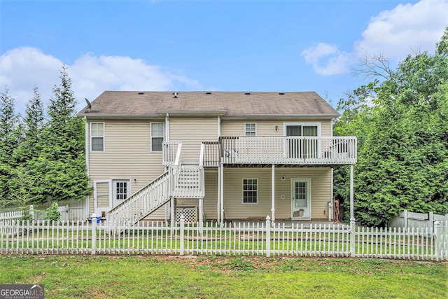 221 Hunters Xing SE, Calhoun, GA 30701 - back of house featuring stairs, a wooden deck, a fenced backyard, and roof with shingles
