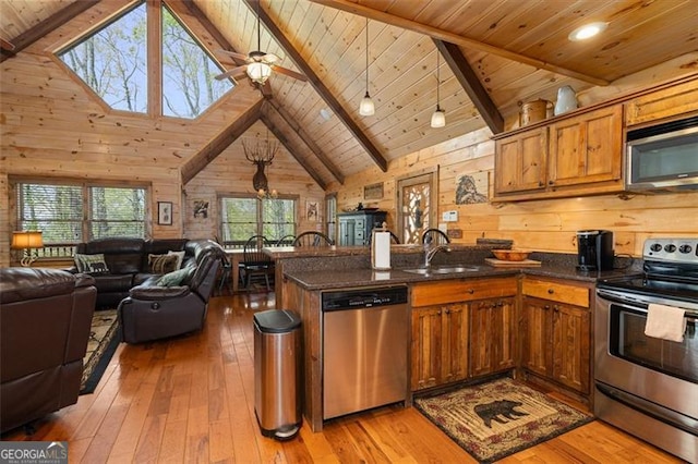 675 Green Ridge Rd, Blue Ridge, GA 30513 - kitchen featuring stainless steel appliances, open floor plan, wooden ceiling, and a sink
