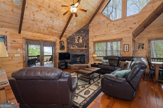 675 Green Ridge Rd, Blue Ridge, GA 30513 - living room featuring wooden walls, a healthy amount of sunlight, and wood ceiling