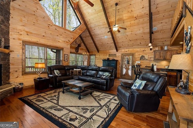 675 Green Ridge Rd, Blue Ridge, GA 30513 - living area with hardwood / wood-style flooring, ceiling fan, wood walls, and high vaulted ceiling