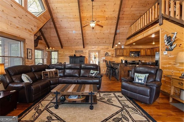 675 Green Ridge Rd, Blue Ridge, GA 30513 - living room featuring wooden walls, beamed ceiling, wood ceiling, and light wood-style floors