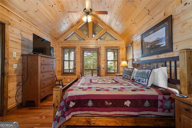 675 Green Ridge Rd, Blue Ridge, GA 30513 - bedroom with access to exterior, wood walls, wood finished floors, wooden ceiling, and lofted ceiling