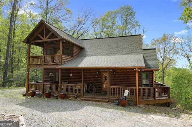 675 Green Ridge Rd, Blue Ridge, GA 30513 - log cabin with a balcony and roof with shingles