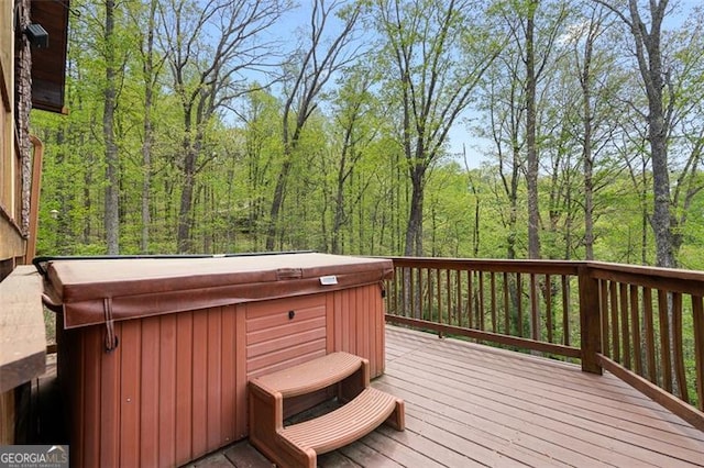 675 Green Ridge Rd, Blue Ridge, GA 30513 - wooden deck with a hot tub and a forest view