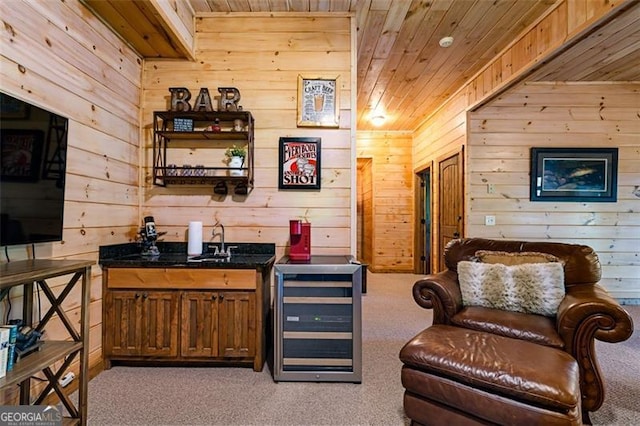 675 Green Ridge Rd, Blue Ridge, GA 30513 - sitting room featuring indoor wet bar, wood walls, carpet, and wine cooler