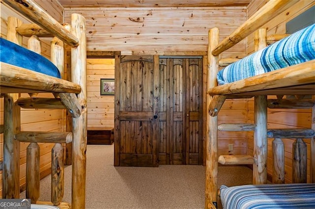 675 Green Ridge Rd, Blue Ridge, GA 30513 - carpeted bedroom with wooden walls and wooden ceiling