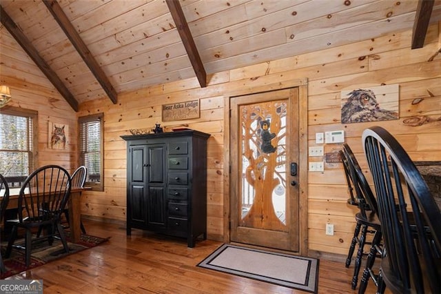 675 Green Ridge Rd, Blue Ridge, GA 30513 - dining room with wooden walls, wooden ceiling, vaulted ceiling with beams, and hardwood / wood-style flooring
