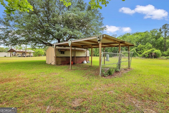 view of yard featuring a carport