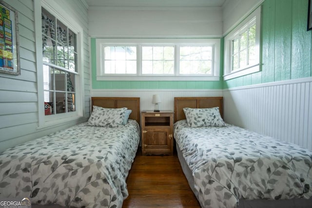 bedroom featuring dark wood-style floors