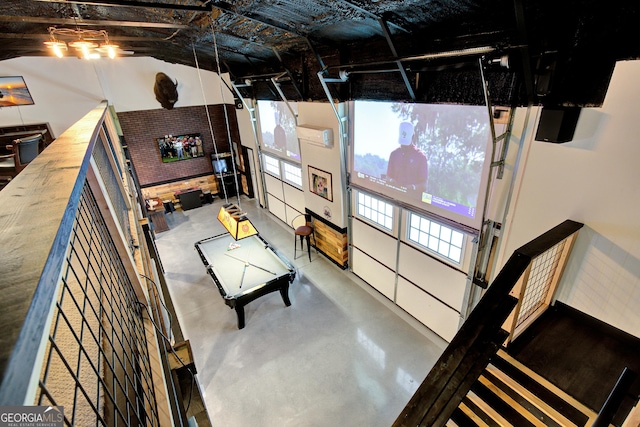 interior space featuring finished concrete floors