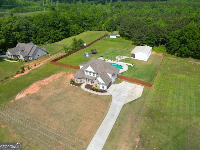 bird's eye view featuring a view of trees