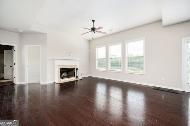 108 Franklin St, Braselton, GA 30517 - unfurnished living room featuring visible vents, a fireplace, baseboards, dark wood-style floors, and a ceiling fan