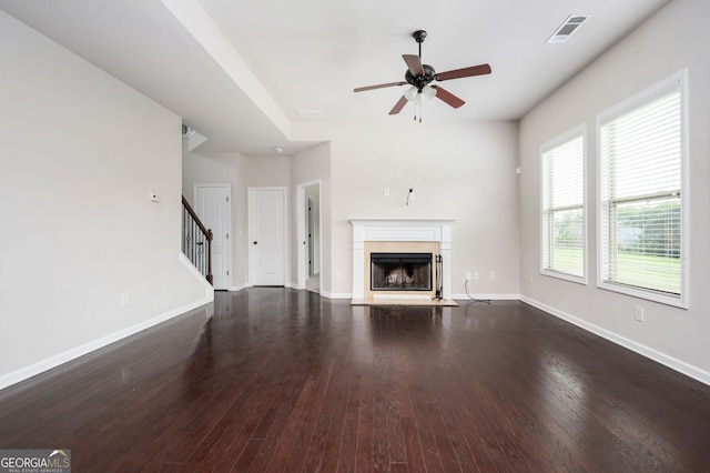 108 Franklin St, Braselton, GA 30517 - unfurnished living room featuring visible vents, stairs, baseboards, ceiling fan, and dark wood-style floors