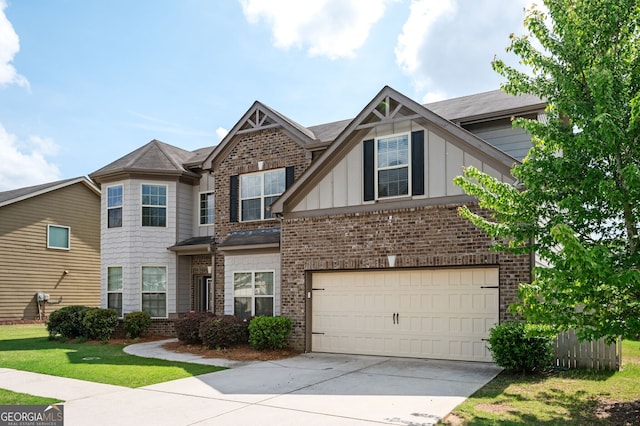 108 Franklin St, Braselton, GA 30517 - craftsman-style house with board and batten siding, a front yard, brick siding, concrete driveway, and an attached garage