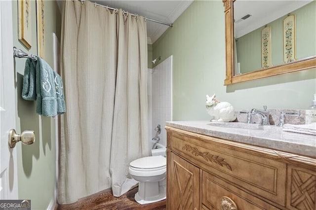 45 Paces W Dr NW, Atlanta, GA 30327 - full bath with crown molding, shower / tub combo with curtain, vanity, toilet, and wood finished floors