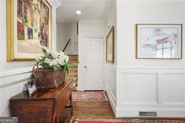 45 Paces W Dr NW, Atlanta, GA 30327 - entryway featuring a wainscoted wall, a decorative wall, wood finished floors, and visible vents