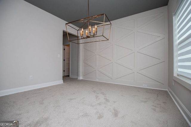 445 Boulder Crest Trl, Villa Rica, GA 30180 - unfurnished dining area featuring a chandelier and carpet flooring