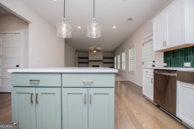 445 Boulder Crest Trl, Villa Rica, GA 30180 - kitchen featuring dishwasher, white cabinetry, decorative backsplash, pendant lighting, and light wood-style flooring