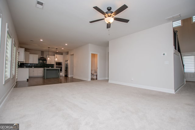445 Boulder Crest Trl, Villa Rica, GA 30180 - unfurnished living room featuring carpet, recessed lighting, and a ceiling fan