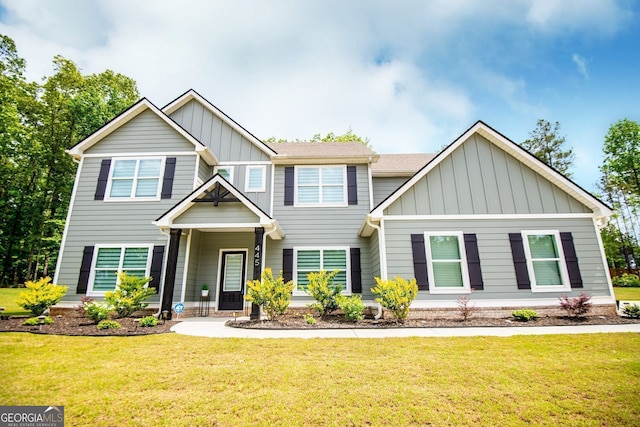 445 Boulder Crest Trl, Villa Rica, GA 30180 - craftsman house featuring board and batten siding and a front lawn