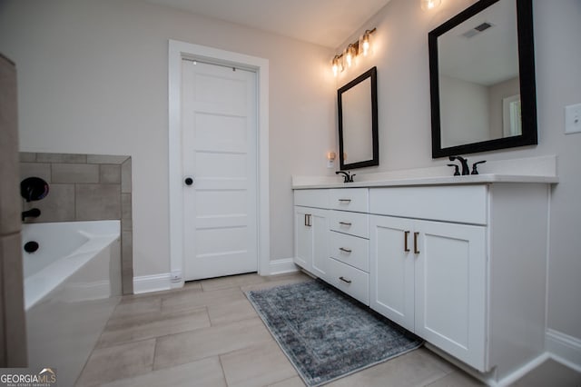 445 Boulder Crest Trl, Villa Rica, GA 30180 - full bath featuring double vanity, a garden tub, and tile patterned flooring