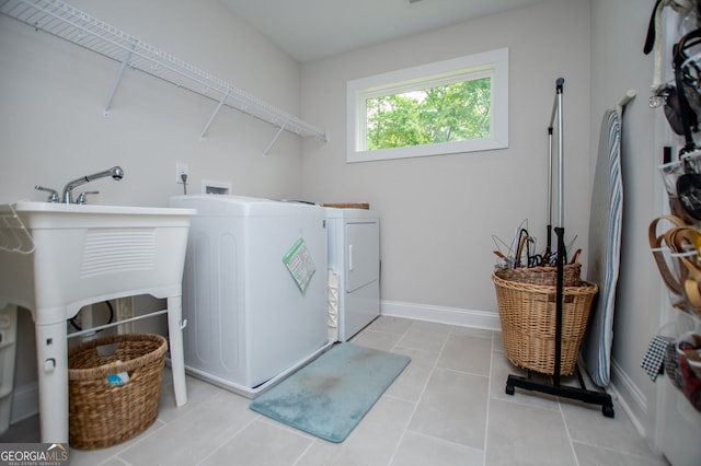 445 Boulder Crest Trl, Villa Rica, GA 30180 - laundry room featuring washing machine and clothes dryer and tile patterned floors