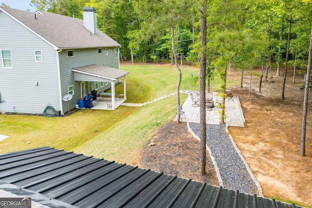 445 Boulder Crest Trl, Villa Rica, GA 30180 - view of grassy yard with a patio