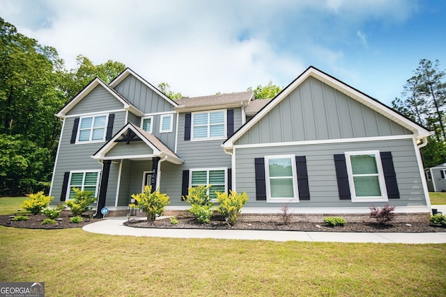 445 Boulder Crest Trl, Villa Rica, GA 30180 - view of front facade featuring board and batten siding and a front lawn
