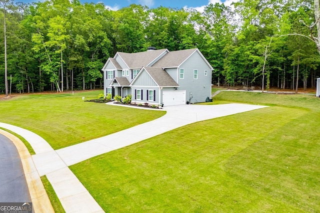 view of front of home with board and batten siding, a shingled roof, driveway, and a front yard