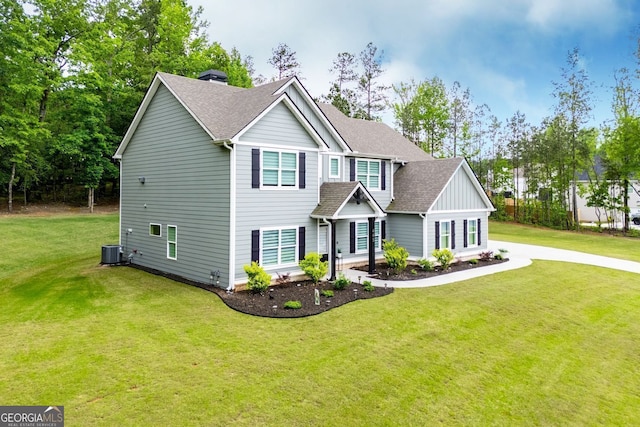 445 Boulder Crest Trl, Villa Rica, GA 30180 - view of front of house featuring a shingled roof and a front lawn