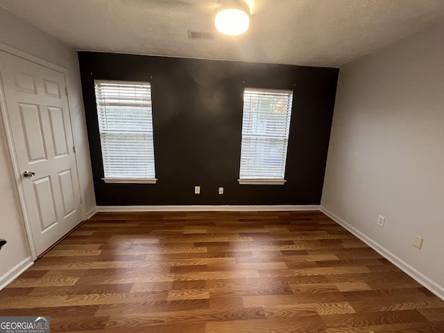 2353 Wellington Cir, Lithonia, GA 30058 - interior space with baseboards and wood finished floors