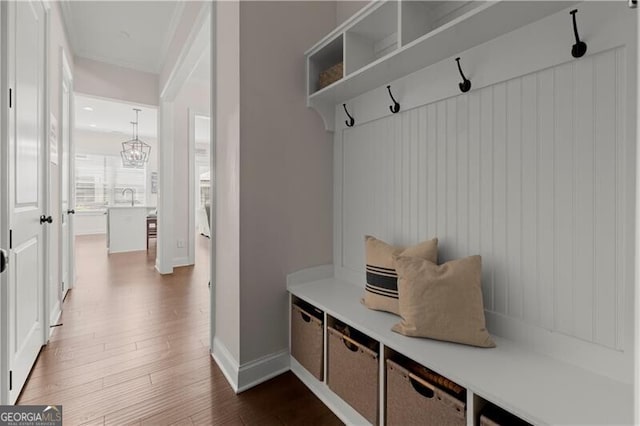 1074 Heyward Way, Alpharetta, GA 30009 - mudroom featuring baseboards, a sink, and dark wood finished floors