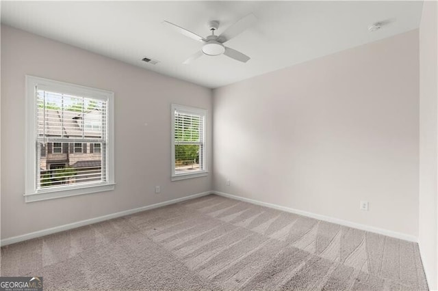 1074 Heyward Way, Alpharetta, GA 30009 - unfurnished room with baseboards, carpet, and a healthy amount of sunlight