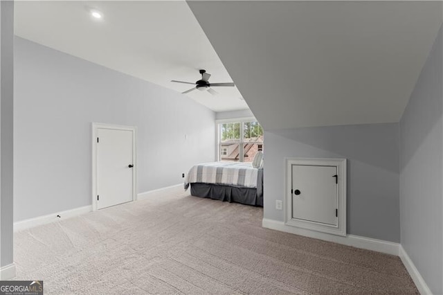 1074 Heyward Way, Alpharetta, GA 30009 - carpeted bedroom featuring a ceiling fan, baseboards, and lofted ceiling