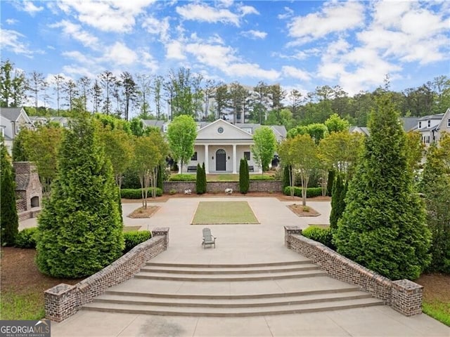 1074 Heyward Way, Alpharetta, GA 30009 - view of front of house featuring stucco siding and a porch