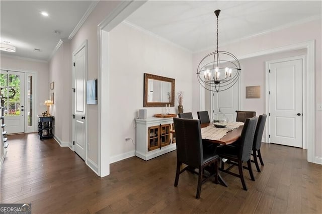 1074 Heyward Way, Alpharetta, GA 30009 - dining area with crown molding, dark wood-style floors, and a chandelier