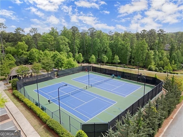 1074 Heyward Way, Alpharetta, GA 30009 - view of sport court featuring fence and a view of trees