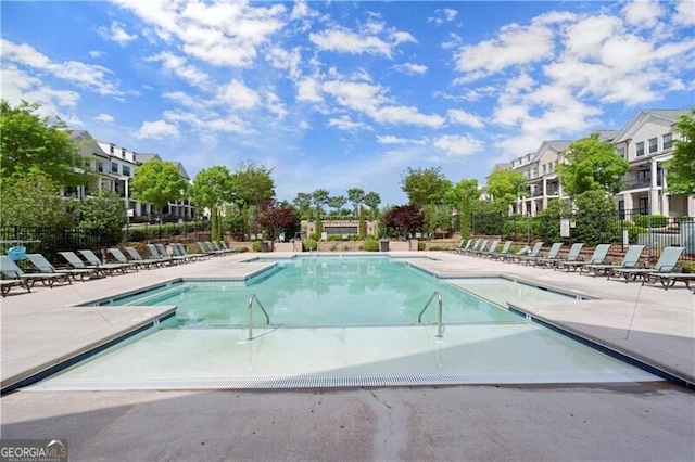 1074 Heyward Way, Alpharetta, GA 30009 - community pool featuring a patio, fence, and a residential view